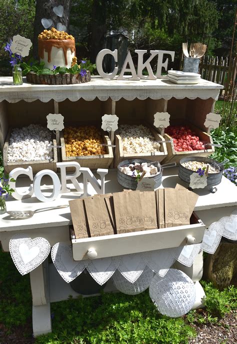 A popcorn bar perfect for a rustic wedding! See all the sweet details!