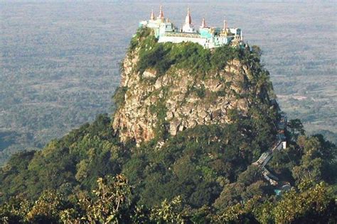 Mount Popa is an extinct volcano on the slopes of which can be found the sacred Popa Taungkalat ...