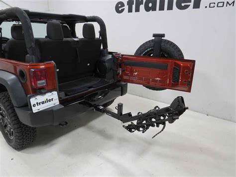 2014 Jeep Wrangler Thule Hitching Post Pro Bike Rack for 4 Bikes - 1-1/4" and 2" Hitches