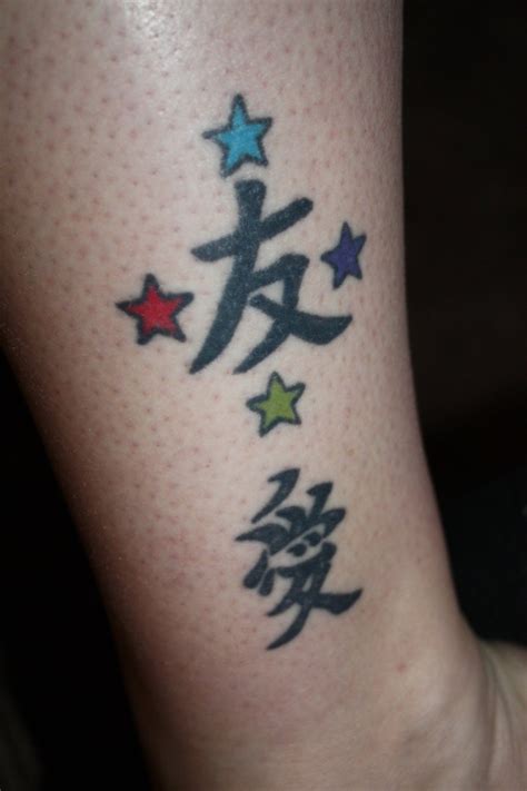 Cute Star And Chinese Symbols Tattoo Design