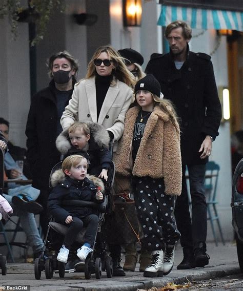 Abbey Clancy steps out with husband Peter Crouch and their children in London - ReadSector