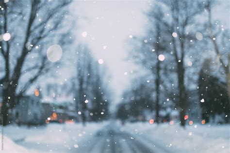 "Snow Falling At Twilight" by Stocksy Contributor "Chelsea Victoria ...