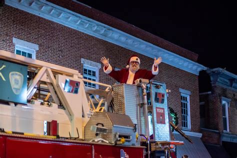 Small town Christmas parade street scenes 21447472 Stock Photo at Vecteezy