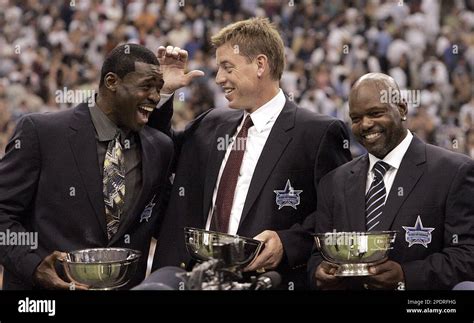 Former Dallas Cowboys players, from left, Michael Irvin, Troy Aikman and Emmitt Smith enjoy a ...