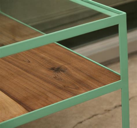 Angle steel coffee table with glass top and walnut shelf For Sale at 1stDibs