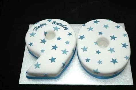 Cake in the shape of the number 90 - two cakes in one! Decorated with blue stars.