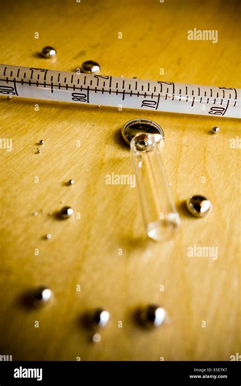 mercury glass thermometer broken Stock Photo - Alamy