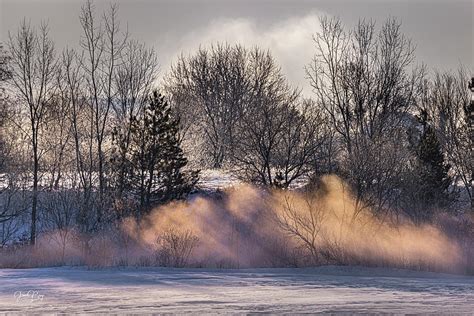 Fog rises from frozen rural landscape Photograph by James Brey - Pixels