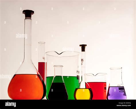 Chemical Flasks and Beakers with coloured fluids Stock Photo - Alamy