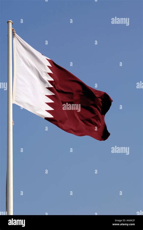 The Qatari flag Stock Photo - Alamy