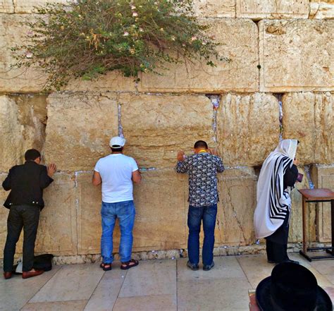 Reciting a Brief Prayer at the Wailing Wall in Jerusalem | Israel ...