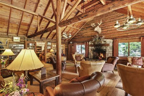 Jenny Lake Lodge Lobby with a Fireplace and Mountain View - Grand Teton National Park, Wyoming ...