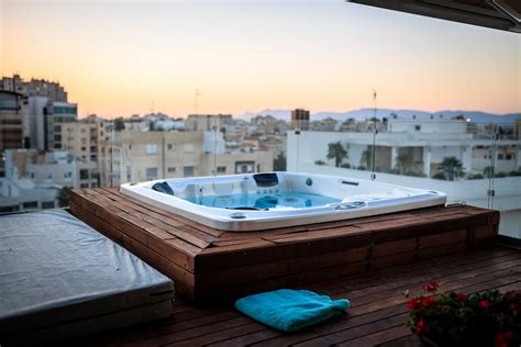 A Jacuzzi on the Balcony Overlooking the City · Free Stock Photo