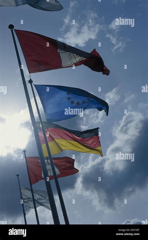 Germany, Hamburg, Caroline Islands fourths, flags, detail, cloudy sky, back light Hanseatic town ...