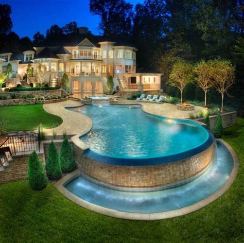 30 Outdoor Swimming Pools, Spectacular Water Features Tucked into Hillsides