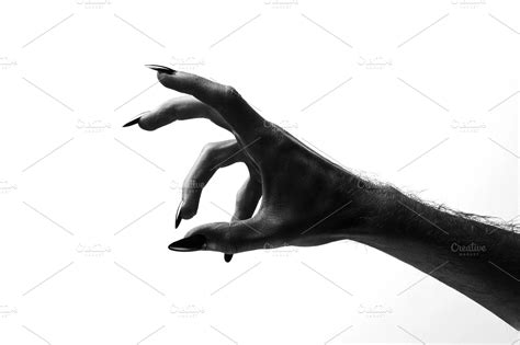 Black creepy halloween monster hand containing halloween, hand, and horror | Holiday Stock ...