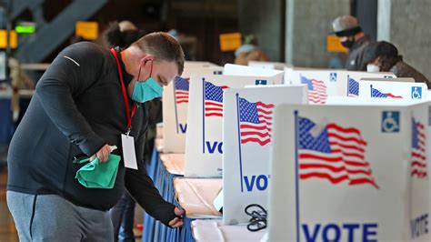 Early voting in Indiana means hours in line, 2 weeks in quarantine