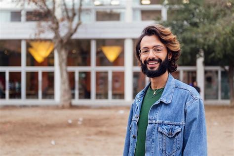 Premium Photo | Man with beard smiling looking at camera