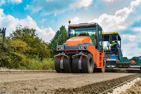 Premium Photo | Roller, construction equipment, on the road repair site.