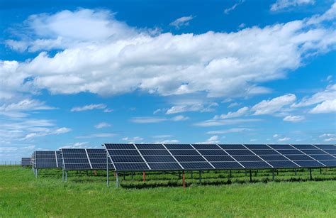 Solar Power Plant, Blue Solar Panels On Grass Field Under Blue S | Citinewsroom - Comprehensive ...