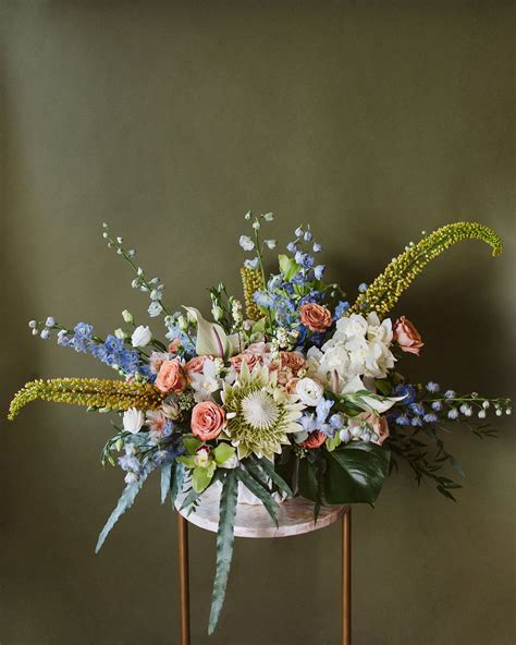 Elegant Victorian Flower Arrangement in Periwinkle, Chartreuse, Peach, and White | Flower ...