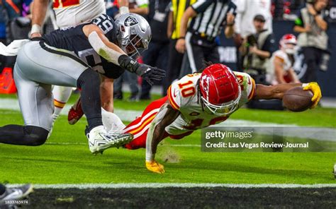 Kansas City Chiefs running back Isiah Pacheco extends the ball... News ...