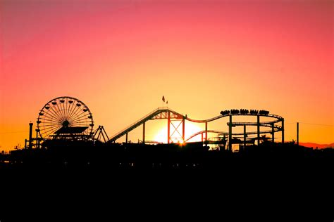 Silhouette of Ferris Wheel during Sunset · Free Stock Photo