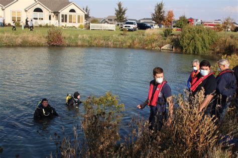 Woman escapes car in pond | WCIA.com