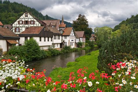 Download Tree Canal House Flower Green Spring Germany Man Made Village HD Wallpaper