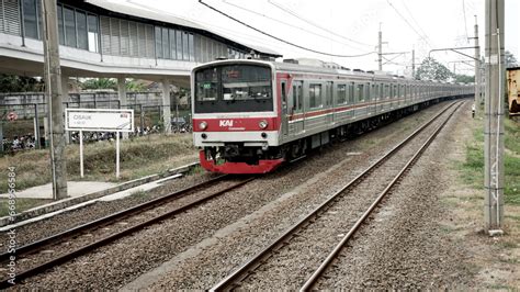 Commuter line, electric train on the railway at Cisauk Station, Serpong, Banten, Indonesia Stock ...