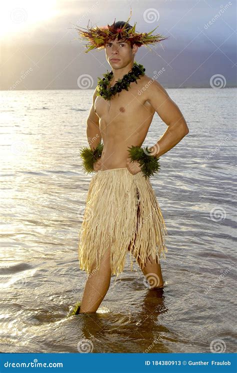 Handsome Male Hula Dancer Stands in the Water As the Sun Sets. Stock Image - Image of costume ...