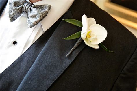 Groom's Single White Orchid Boutonniere