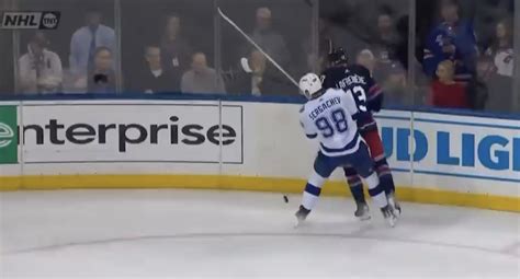 Video: Mikhail Sergachev Suffers Gruesome Leg Injury vs. Rangers - The Spun