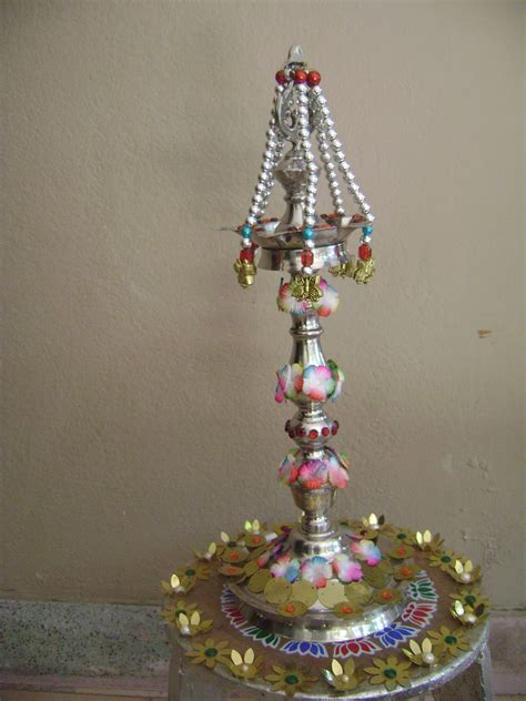 kuthu vilakku decoration | Lamp decor, Rangoli designs, Decor