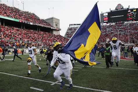 No. 3 Michigan beats Ohio State for 2nd straight year, 45-23 | AP News