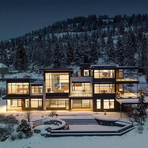 LUXREALIST on Instagram: "Stunning glass mansion on the side of a snowy ...