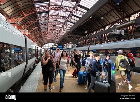 Copenhagen Central Station Denmark - passengers and trains at the ...