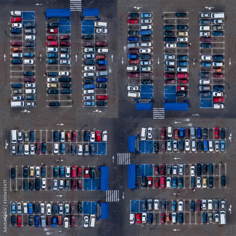 Square aerial top view parking lot cars. Parking lot top view cars are parked in open parking ...