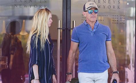 Doting dad Antonio Banderas shops till he drops with daughter Stella.