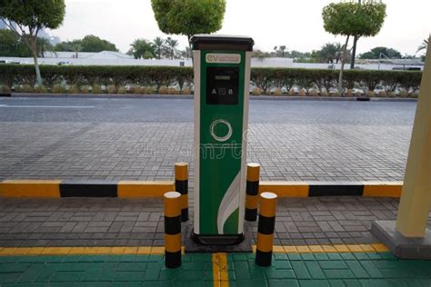 Smart Dubai Car Charging Stations in Parking Lot. Charging Modern ...