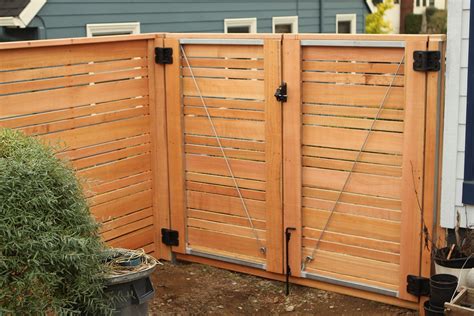 Double door gate | Horizontal wood fence with alternating picket sizes for an extra unique look ...