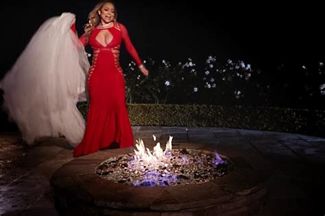 Mariah Carey torches $250k wedding dress for music video