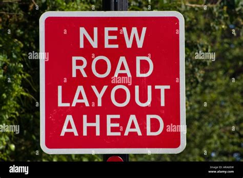 New road layout ahead road sign Stock Photo - Alamy