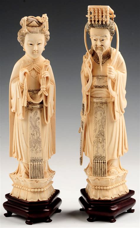 #399: A PAIR CHINESE ANTIQUE CARVED IVORY EMPORER AND EM