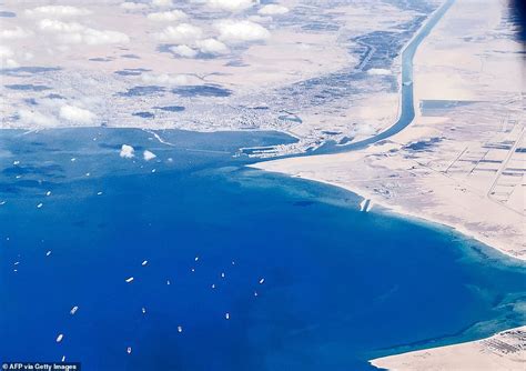 Suez Canal mega-ship is on the move! Ever Given is being pulled along after it was successfully ...