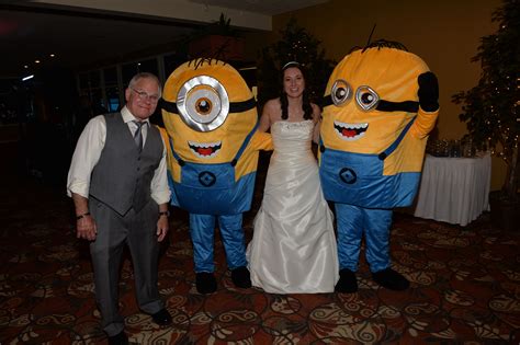 photograph of the bride and groom with minions | Fun wedding ...