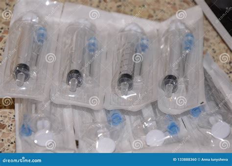 Packed Medical Syringes with Needles in Plastic Packaging. Stock Photo ...