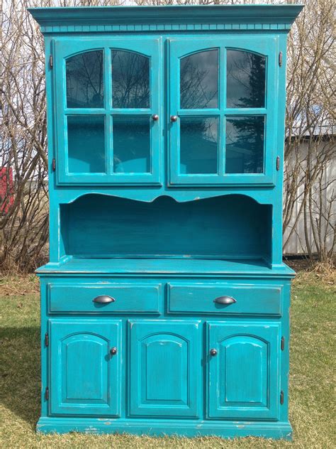 Turquoise blue china cabinet. Painted and Distressed furniture. Check us out on Facebook ...