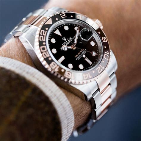 The cosmopolitan watch. The Rolex GMT-Master II in Oystersteel and 18 ...