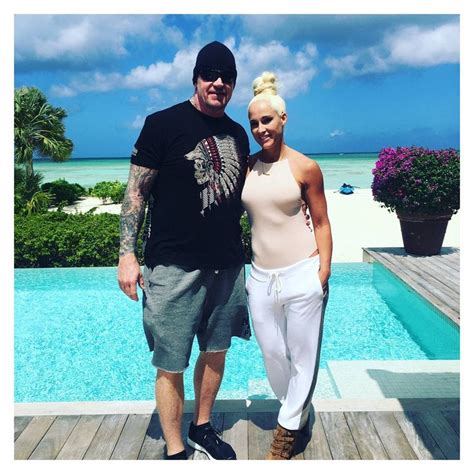 Iconic WWE Superstar The Undertaker (Mark Calaway) and his wife ...